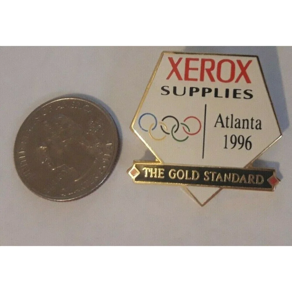 Xerox Supplies The Gold Standard Olympic Pin 1996 Atlanta Enamel Lapel Tack logo